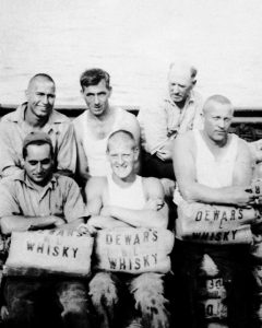 Malahat crew fondly embracing some of her load, Rum Row, Ensenada, early 1930 Hugh Garling collection